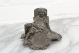 Cast Metal Match Stick Holder with Young Boy Leaning Against a Bucket