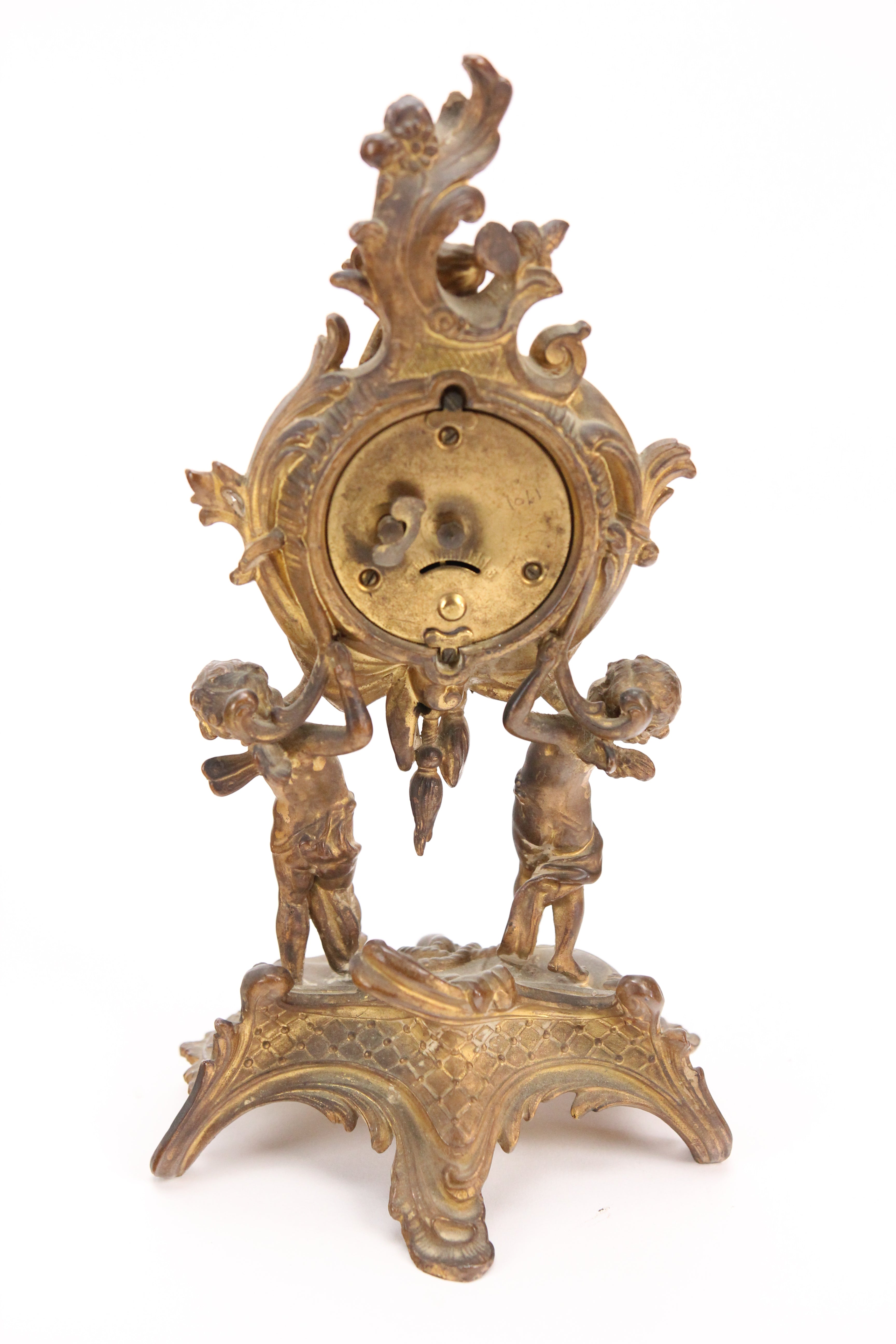 Antique brass gilded deals clock, cherub and griffen brass