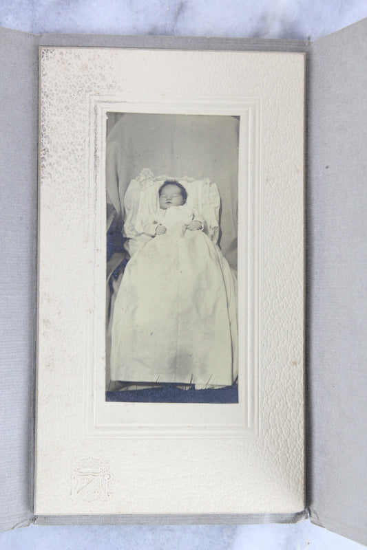 Postmortem Matted Photograph in Folder of a Deceased Baby