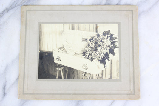 Postmortem Matted Photograph of Young Child in Coffin, "Our Darling"