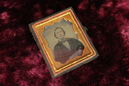 Ninth Plate Ambrotype Photograph of a Young Man in a Half Union Case