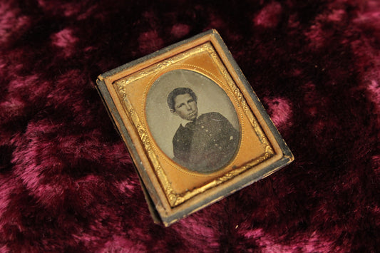 Ninth Plate Ambrotype Photograph of a Young Boy in a Half Union Case