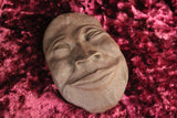 Brown Pottery Grinning Ceramic Face