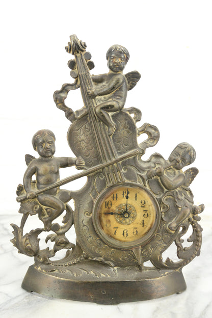 Spelter Clock with Cherubs on a Violin, Made in U.S.A.