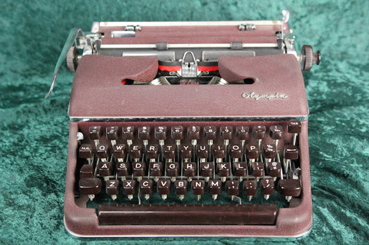 Olympia SM-4 DeLuxe Portable Manual Typewriter, Maroon Color, 1958