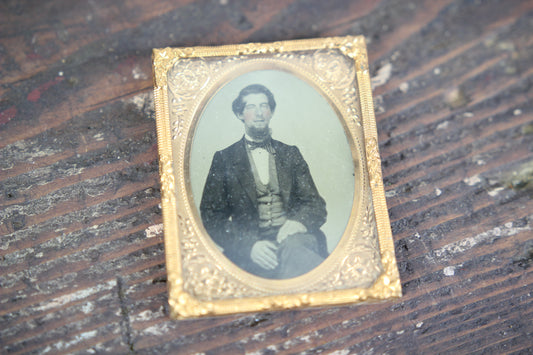 Ambrotype Photograph of a Young Man with a Beard and Striped Bowtie