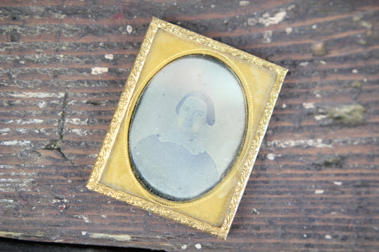 Daguerreotype Photograph of a Woman in Black Dress with White Collar