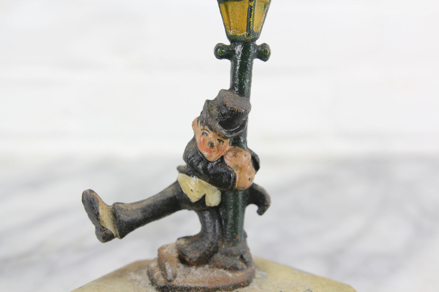 Die Cast Metal Ashtray with Drunk Man Hanging on Lamp Post, John Wright