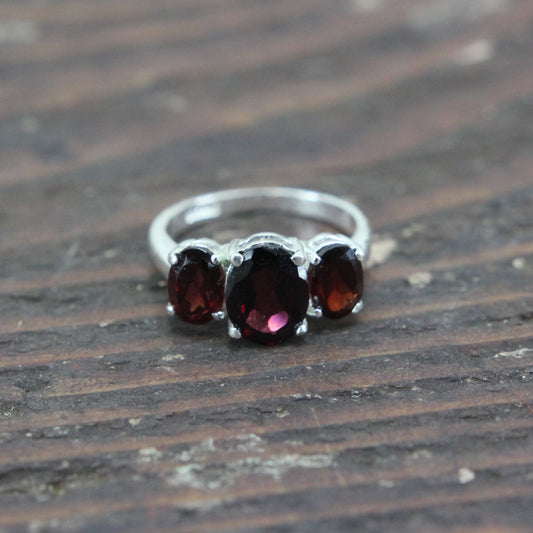 Sterling Silver Ring with Three Deep Red Stones - Size 6.75