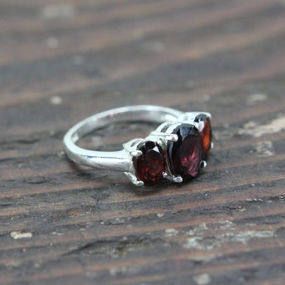 Sterling Silver Ring with Three Deep Red Stones - Size 6.75