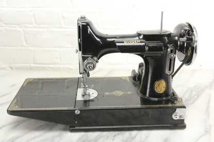 Model 221 Featherweight Sewing Machine by The Singer Manufacturing Co., 1933