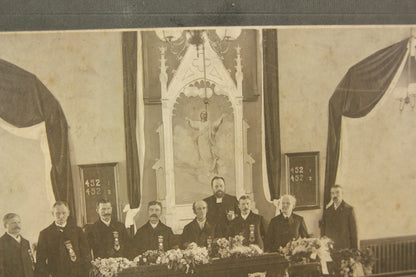 Matted Funeral Photograph of a Casket in a Church Surrounded by Mourners