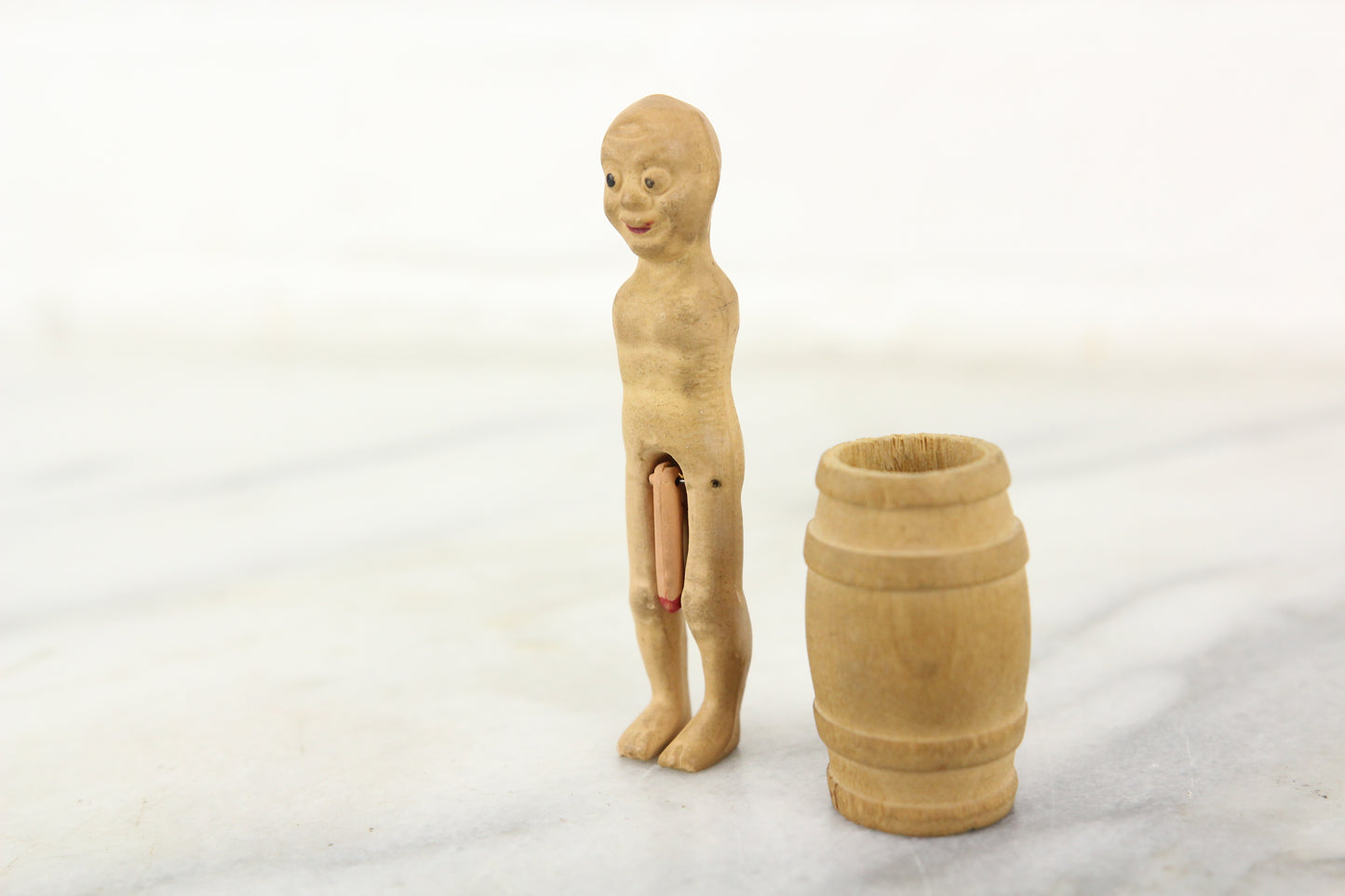 Naked Man in Barrel Risque Wood and Composition Figurine
