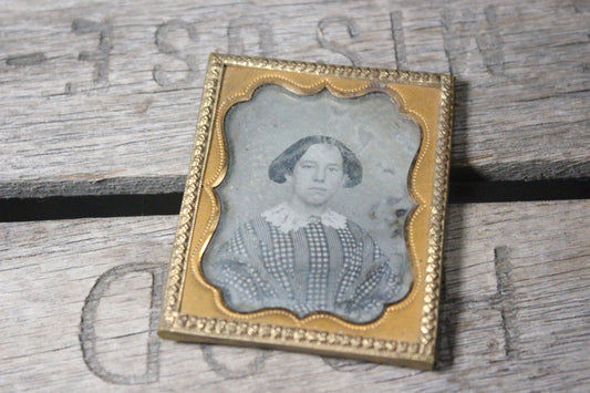 Daguerreotype Photograph of a Young Woman with a Lace Collar