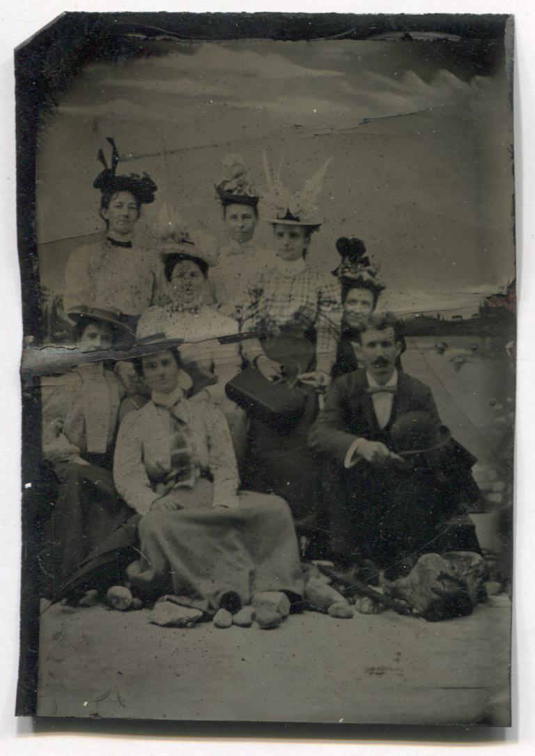 Tintype Group Photograph of Seven Women and a Man