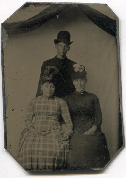 Tintype Photograph of a Man in a Bowler Hat with Two Ladies
