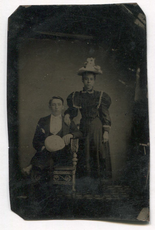 Tintype Photograph of a Couple with Fancy Hats