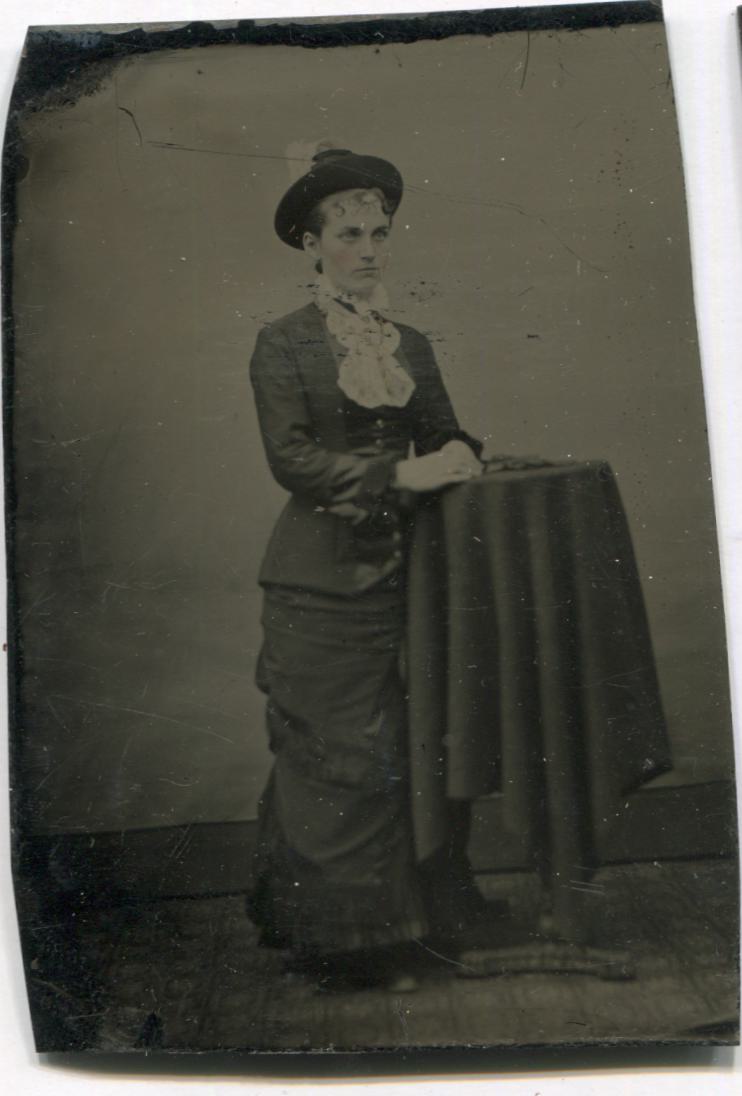 Tintype Photograph of a Pretty Young Lady Standing at a Table