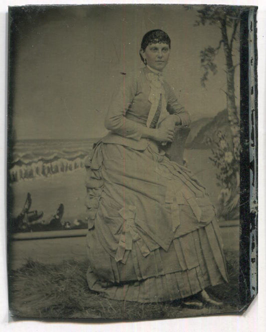 Tintype Photograph of a Woman in a Lovely Dress Leaning on a Chair