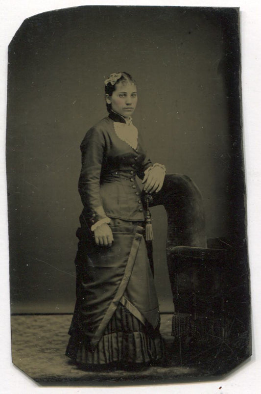 Tintype Photograph of a Young Woman Leaning On a Chair