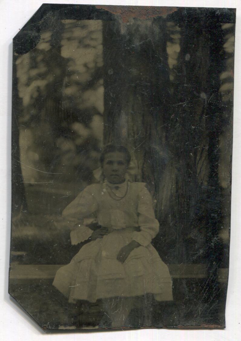 Tintype Photograph of a Young Girl with Trees in the Background