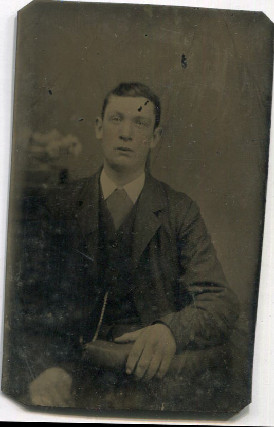 Tintype Photograph of a Man with Huge Hands