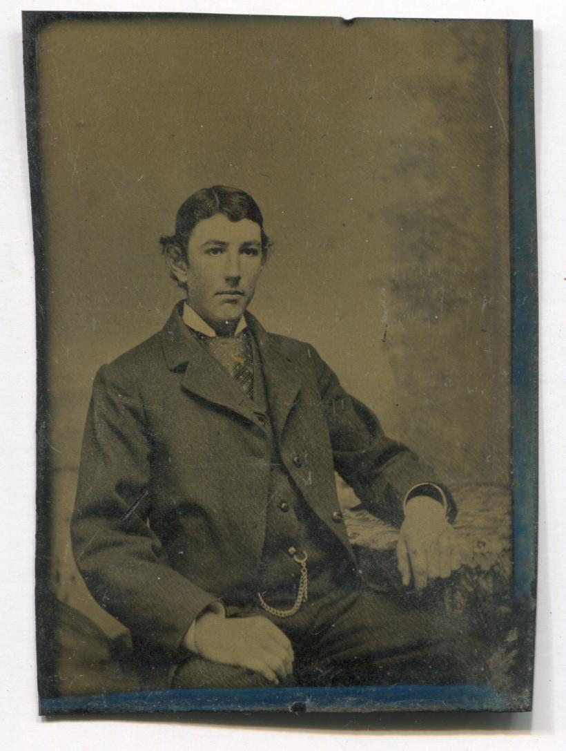 Tintype Photograph of a Young Man Seated with a Watch Chain