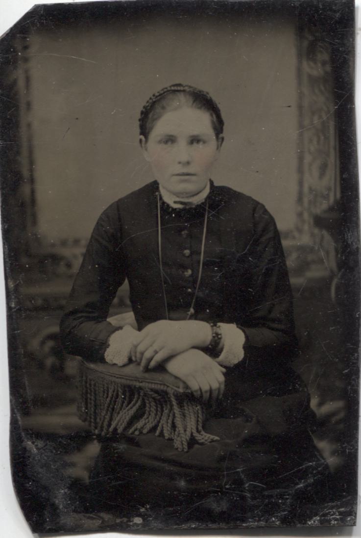 Tintype Photograph of a Young Woman with Crossed Hands