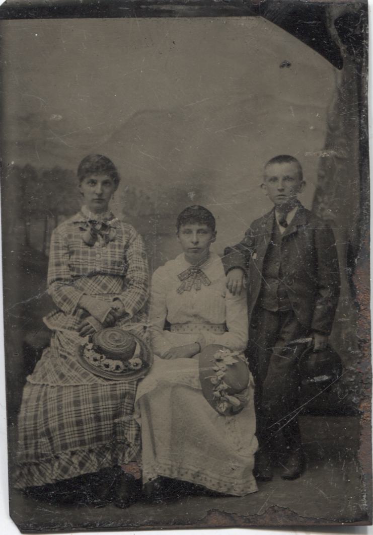 Tintype Photograph of Three Siblings, Two Sisters and a Brother