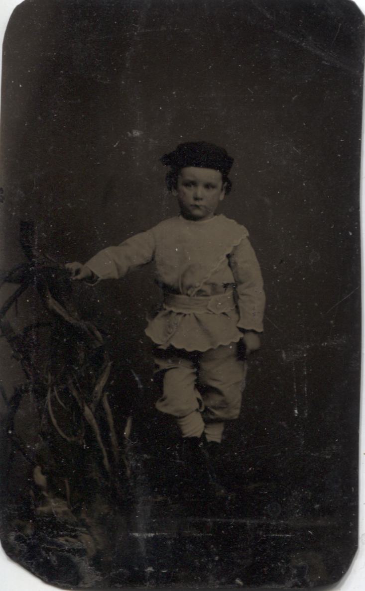 Tintype Photograph of a Young Child in Peculiar Dress