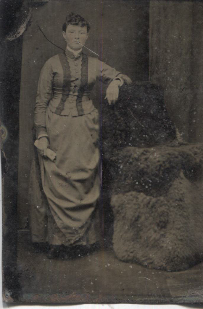 Tintype Photograph of a Woman Standing Next to a Wool Chair