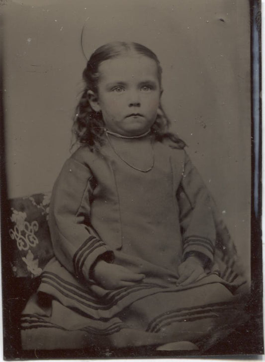 Tintype Photograph of a Frowning Young Girl