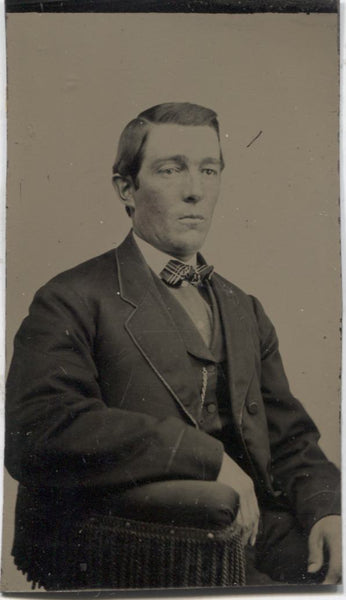 Tintype Photograph of a Seated Man Wearing a Bowtie