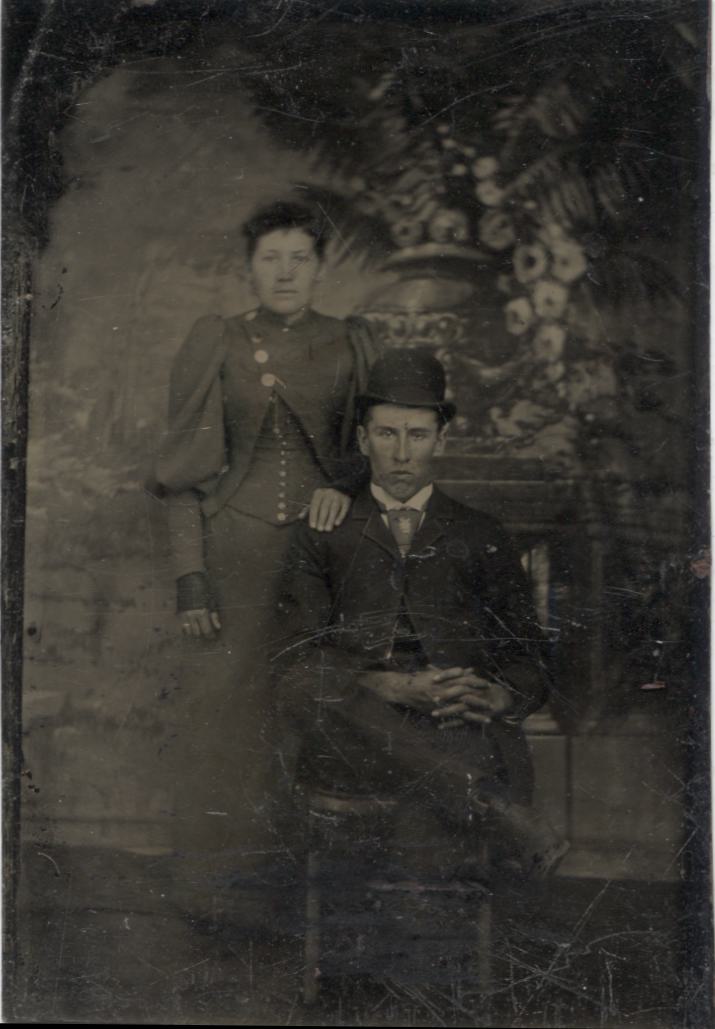 Tintype Photograph of a Young Couple with a Stern Looking Man