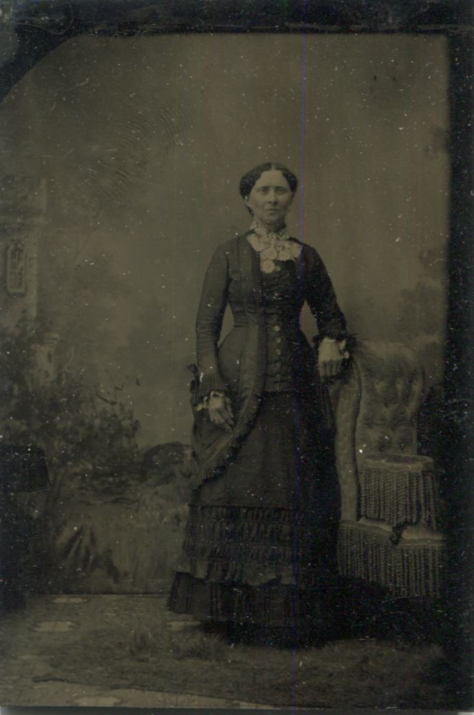 Tintype Photograph of a Tall and Slender Older Woman Leaning on a Chair
